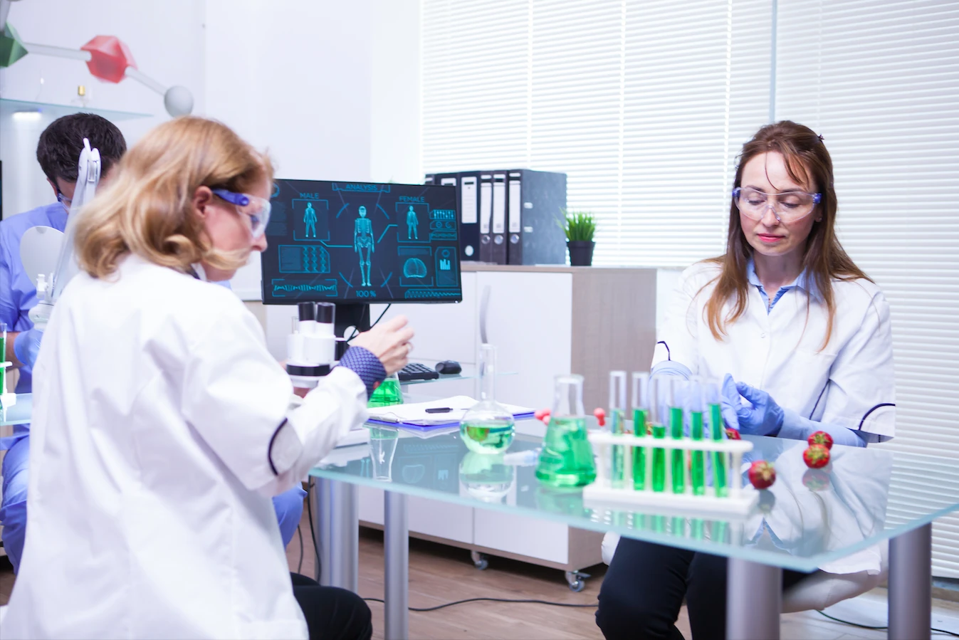 Two researchers are testing a new medication through digital twins, another use case for digital twin in healthcare. Two researchers are testing a new medication through digital twins, another use case for digital twin in healthcare.