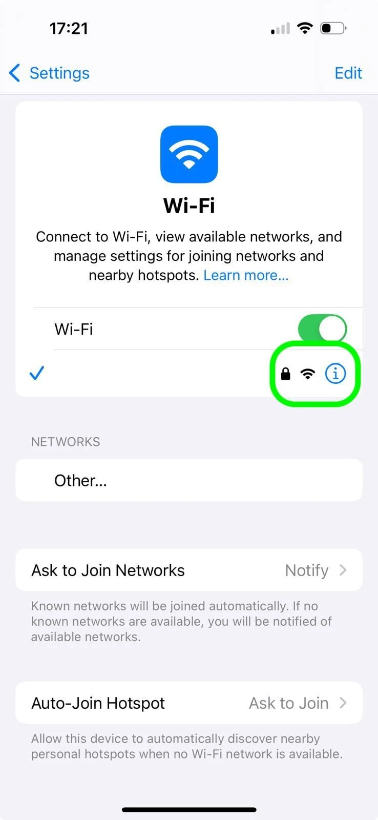 iPhone Wi-Fi settings screen highlighting the information icon next to the connected Wi-Fi network for configuring proxy settings.